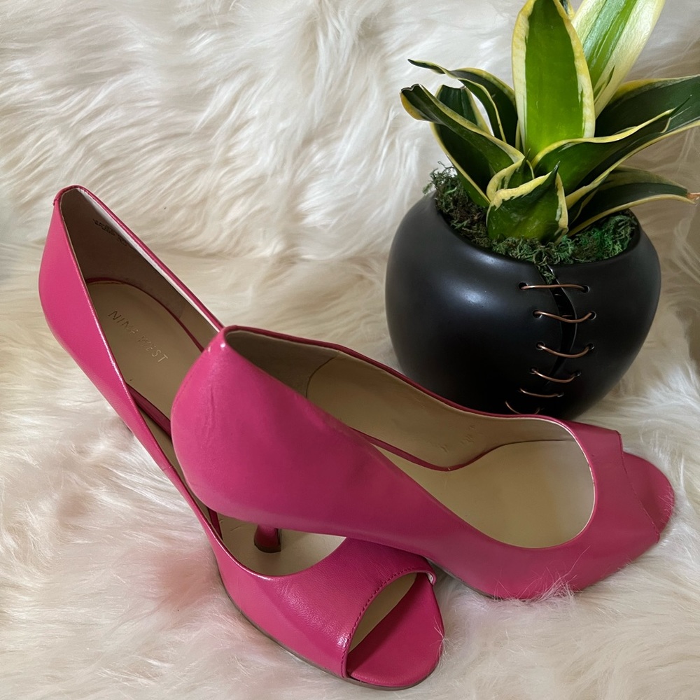 Pretty in pink Nine West peep toe pumps!